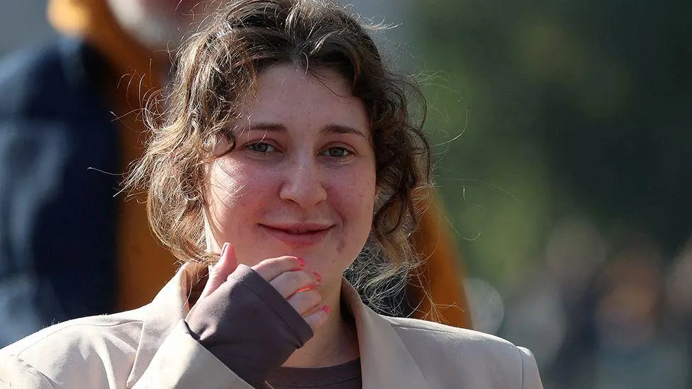 Pregnant Bella Culley arrives home from Georgia